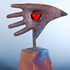 "The Hand Gives The Heart Wings"