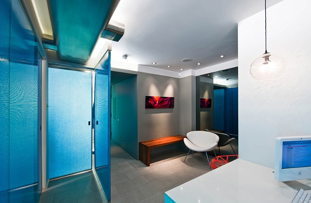 E. 40th St. Dental Office, modern dental office,  reception area, walnut door, by Doug Stiles Interior Design
