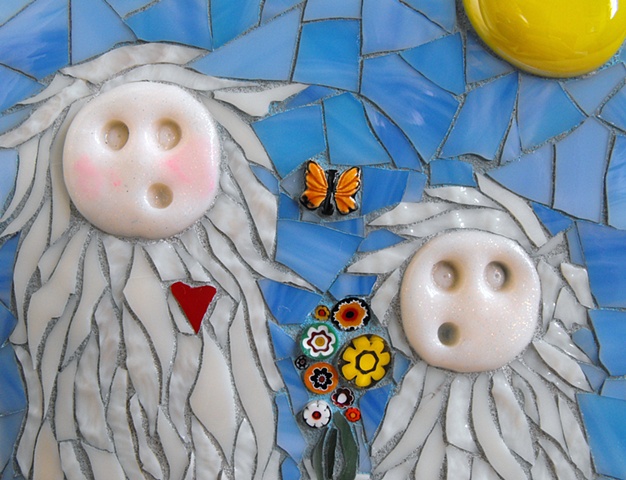 stained glass mosaic of mother and baby Yeti