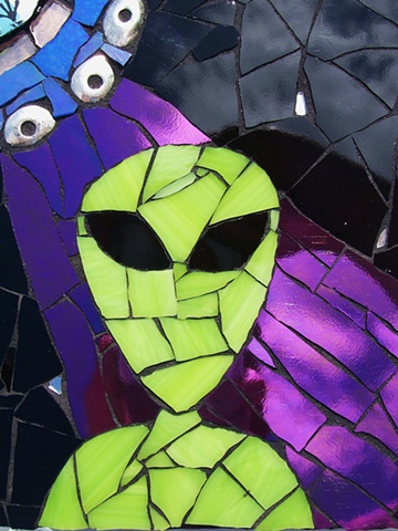stained glass mosaic portrait of a green alien and spaceship