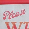 PLEASE WAIT TO BE SEATED sandwich board sign