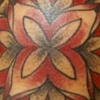 shoulder cap tattoo