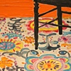 Look at that Rug and Half of a Black Chair