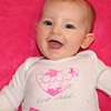 Charlotte in "too shea" baby wear!