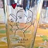 Hand Drawn Portrait shown on Pint Glass as Wedding Favor