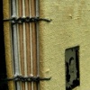 yellow silk book with a tiny tin-type