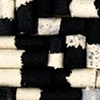 Untitled (natural canvas rolled, dipped in black paint)