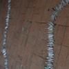 Exhibition Flying Carpet Prayers at El P&oacute;sito, rolled newspaper from Catalunya in the shape of Ca&ntilde;adas Real