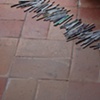 Exhibition Flying Carpet Prayers at El P&oacute;sito,  rolled newspaper from Catalunya in the shape of Ca&ntilde;adas Real