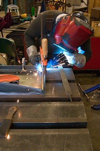 welding the "tail" on a  new bench