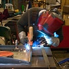 welding the "tail" on a  new bench