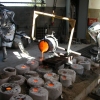 Pouring the  bronze