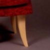 Bookshelf with Red Miniskirt