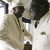 Pastor Yul Dorn, Jr. greets a fellow pastor at True Light Church of God in Christ in Daly City,