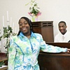 Pastor Dorn's daughter warms up with fellow musicians before the service.