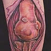 Exposed elbow tattoo done by Nate Cook - Featured in Tabu Tattoo Issue #43