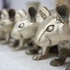 bronze gerbils in a row