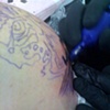 Tattooing Deran of atomic tattoos