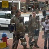 Talking to passers-by.