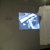 Disassembled Past- Shot of video playing on wall in gallery.  