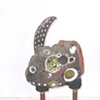 Footed Figure with Holes