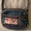 "Pieces of Me" detail denim handbag
