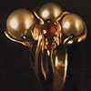 Freshwater Pearls 
Rubies 
18kt. Gold