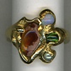 Mexican Matrix Opal
Australian Opal
Tourmaline 
Abalone Pearl 
24kt. Gold