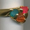 Natural Crystals of 
 Paraiba Tourmaline
 Spessartine Garnet 
 Spinel 
 24kt. Gold