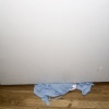 Kate's Shirt Under the Door
