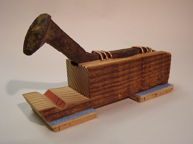 mixed media sculpture, railroad spike