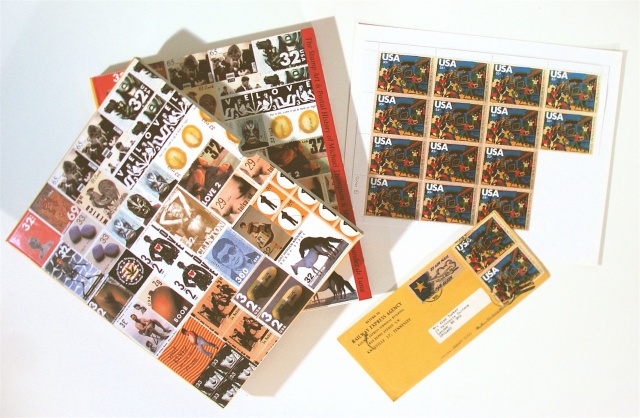 The * Super Deluxe Hardcover Edition with Dustcover* includes a sheet of stamps and a canceled envelope. This edition is limited to 85 envelopes. The stamp being offered is called "Depredation of the Mail", and can be viewed on the following pages.