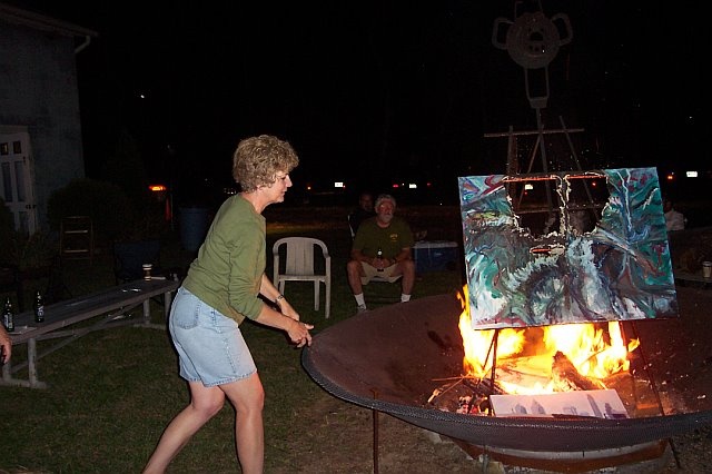 Ellen tossing offering in