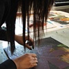 Student working on a gelatin plate in Susan's studio.