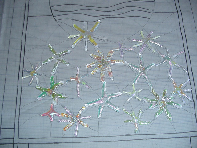 Design with fused glass inclusions