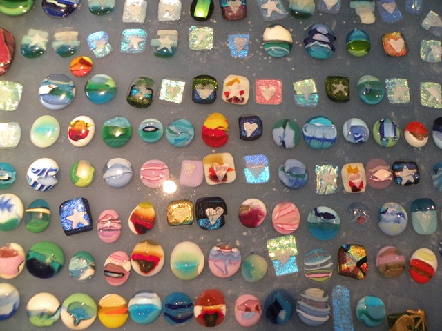 Custom fused glass pendants infused with sand from your favorite beaches