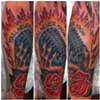 bircage microphone tattoo by sanchez tattooer