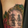 chris's brooch tattoo