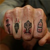 vin's knuckle tattoos