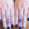 simone's finger tattoos