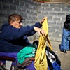 on most weekends, Judy and Peter take their routine walk around the neighborhood to search the dumpsters. 