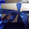 Plain gold box with ribbon